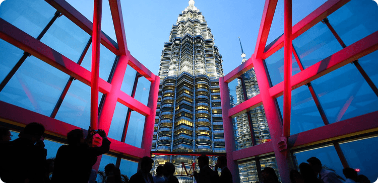 View of the Petronas Towers at sunset from Marini's on 57 rooftop bar